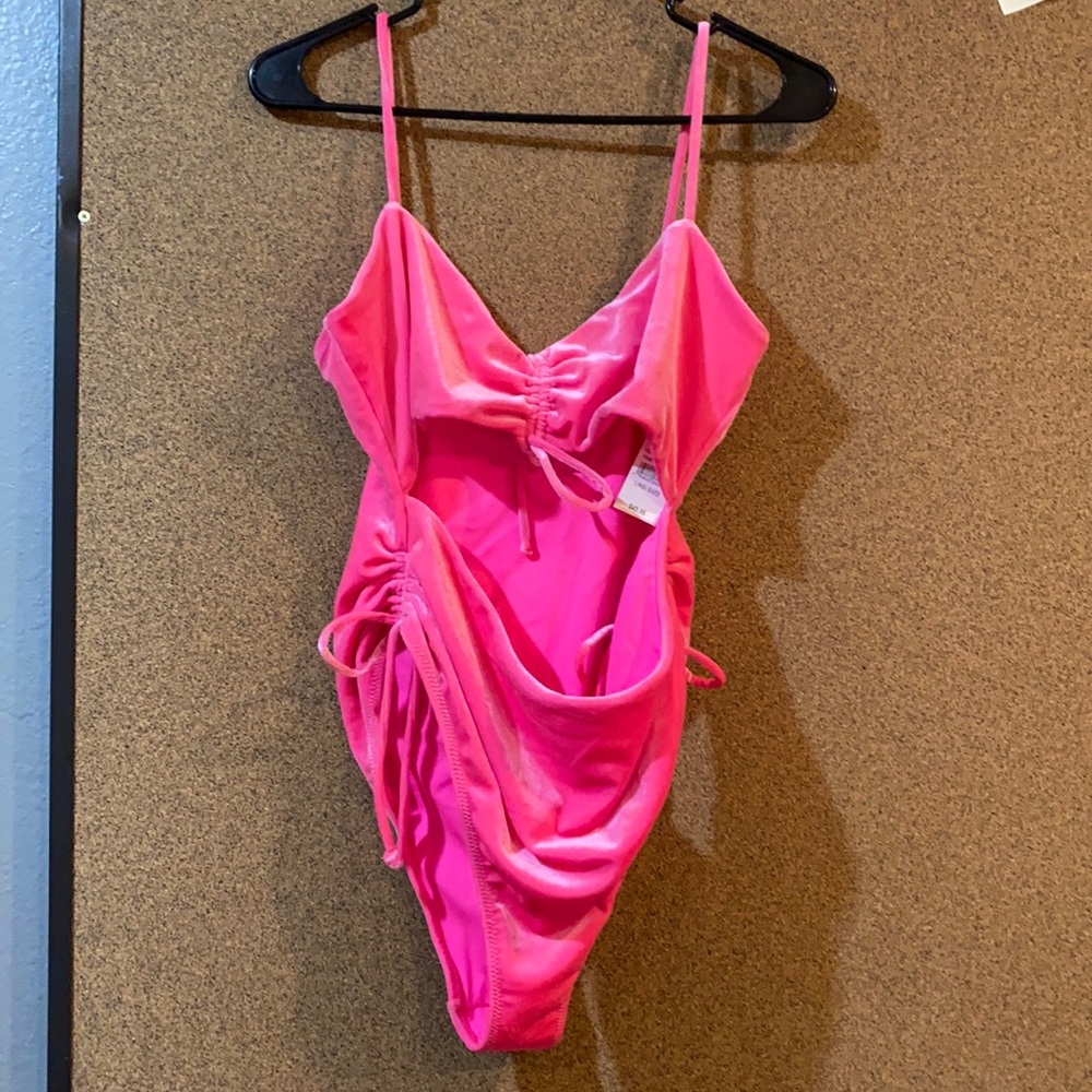 Kendall and Kylie cut out one piece swim suit